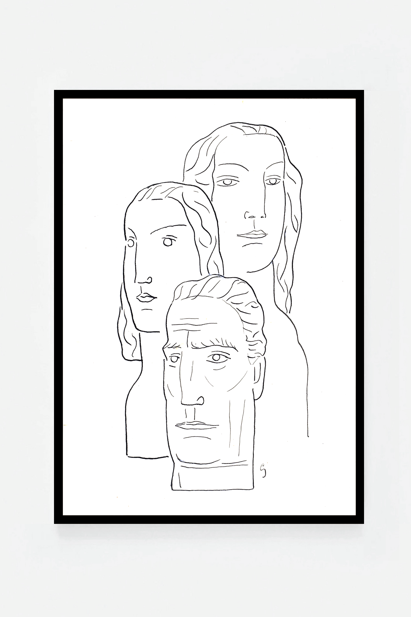 Two female heads and a male head