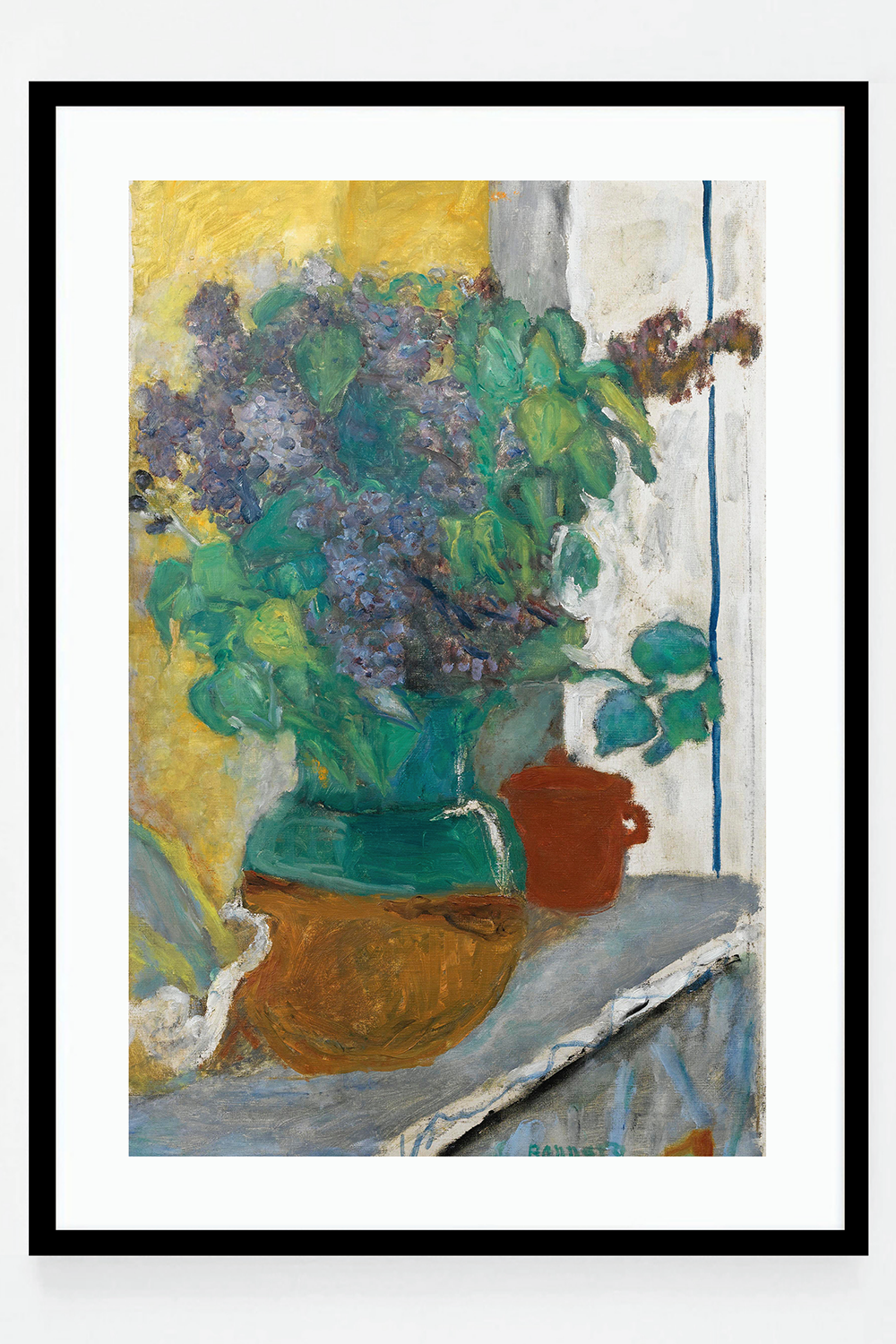 Purple lilac in a yellow and green earthen vase
